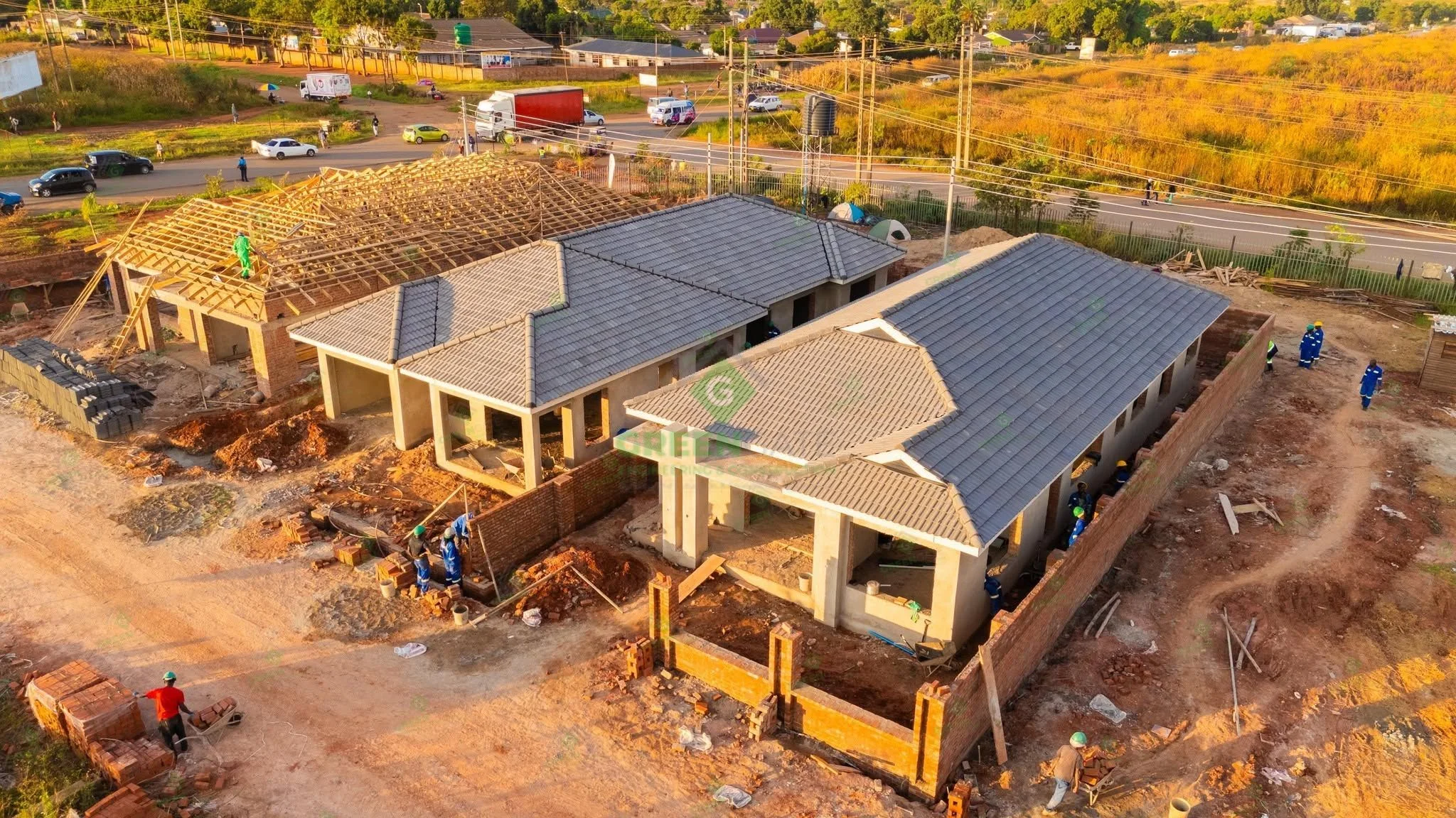 Aerial view of residential construction work with Greengate team members on site